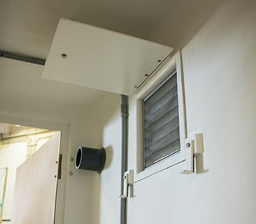 Fiberglass enclosured can be customized with doors, hatches, vents, and many other options.